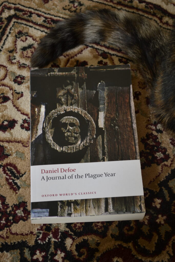 A tail wraps around A Journal of a Plague Year.