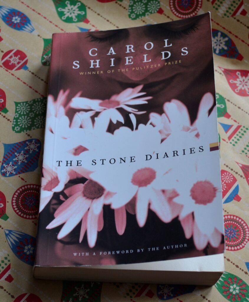 The Stone Diaries sits on wrapping paper.