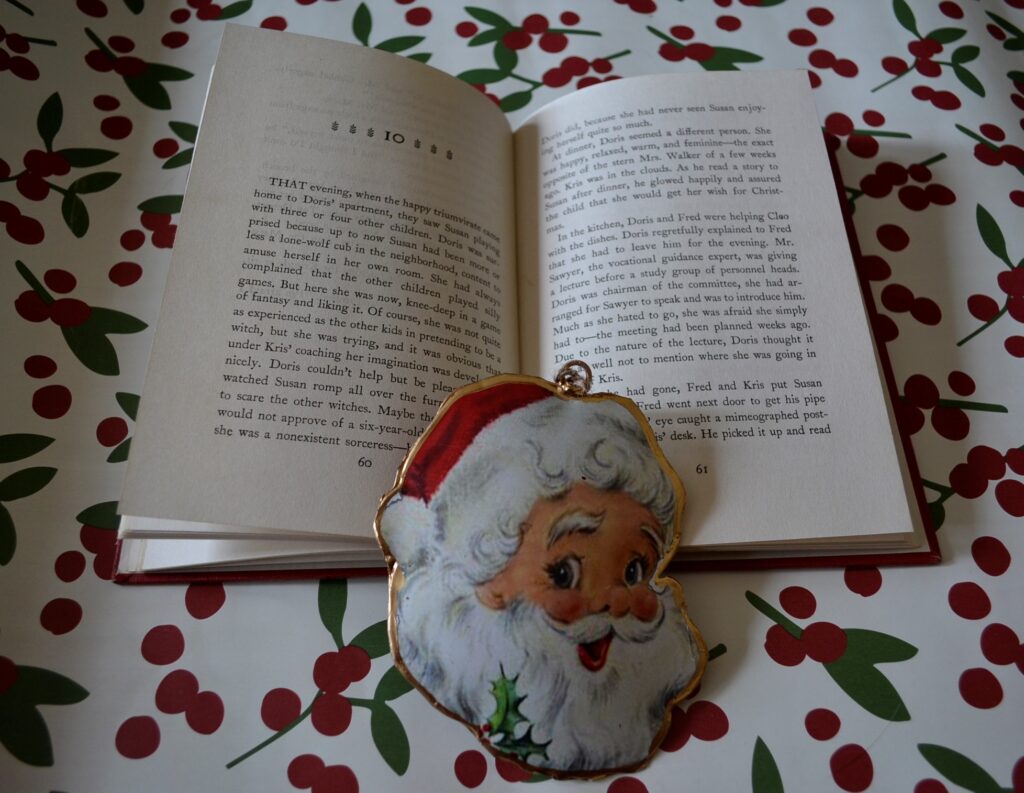 A book is held open by an ornament to Chapter 10, illustrated with snowflakes.