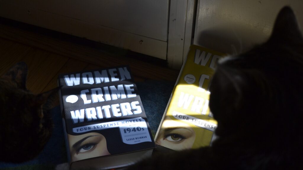 In dark shadows and sharp sunlight, two volumes of Women Crime Writers lurk.