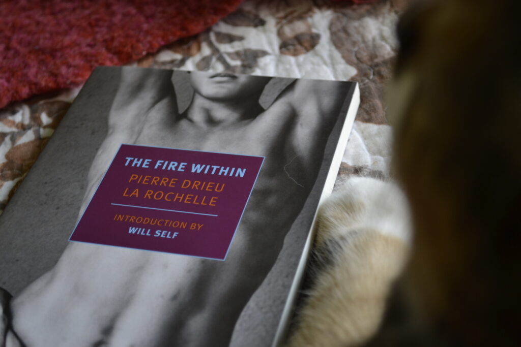 The Fire Within by Pierre Drieu La Rochelle has a cover with a black-and-white photo of a male torso, stripped to the waist and lounging with arms up.