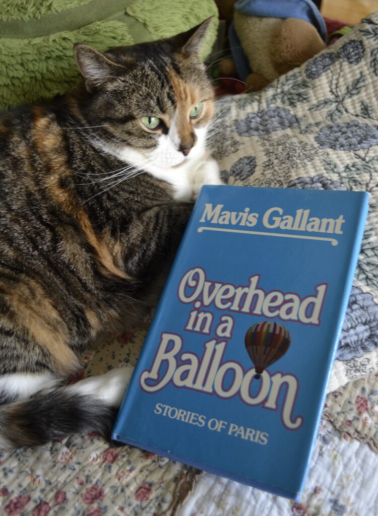 Overhead in a Balloon: Stories of Paris is a bright blue hardcover book by Mavis Gallant. A small picture of a hot-air balloon sits amid the title.