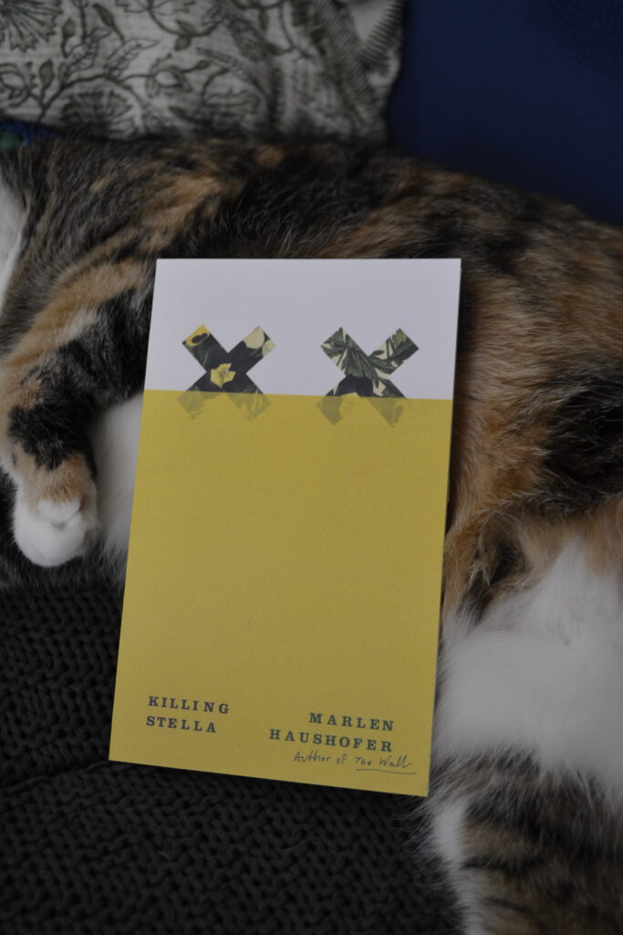 Killing Stella by Marlen Haushofer is a slender paperback with a yellow cover featuring two floral x's.